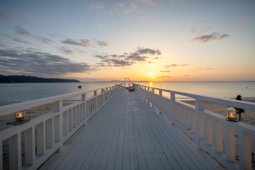 Okinawan Sunset Sunset on the pier of Okuma Beach, Okinawa… Hervé