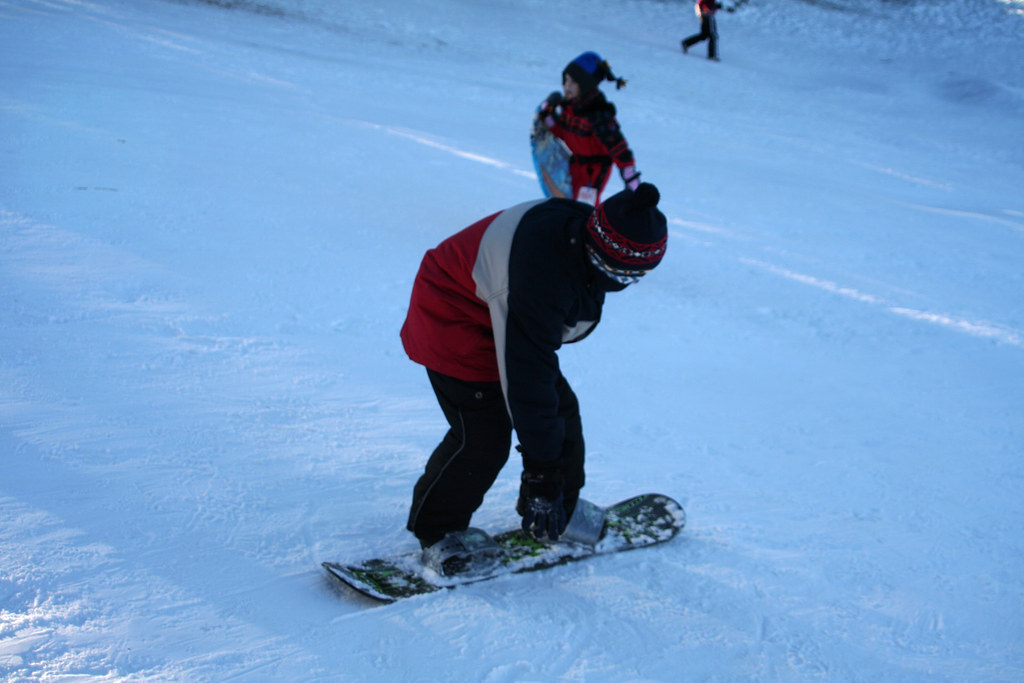 IMG_4076 Aaron learning to snowboard on the sled hill. Scott Ingram
