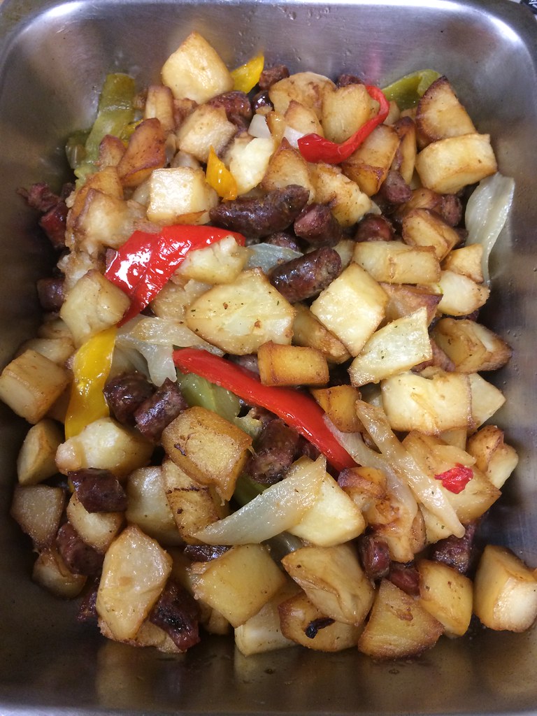 Fried Potatoes with peppers, onions, and cheese and parsle… Flickr