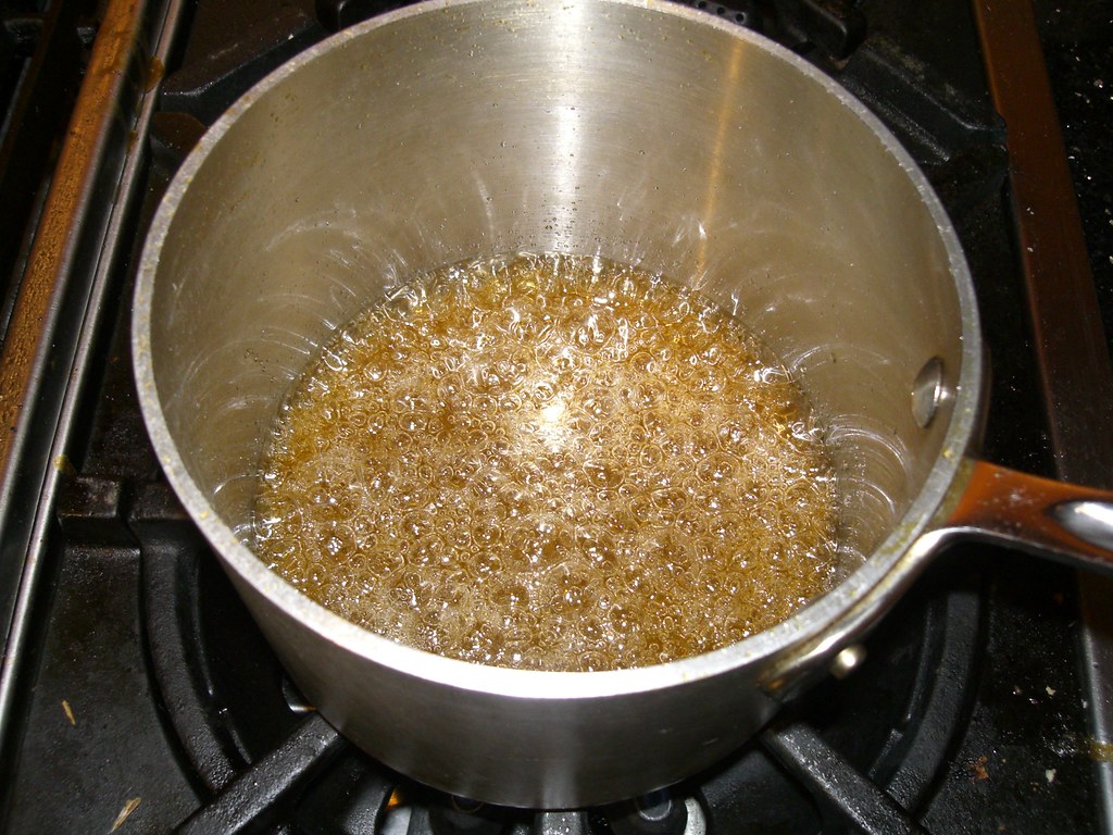 Making the Caramel The sugar, water, and corn syrup bubbli… Flickr