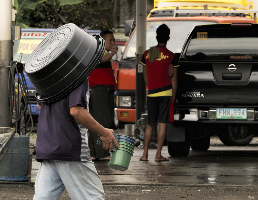 Bucket Seller Gentleman selling Buckets and Bowls in the s… Flickr