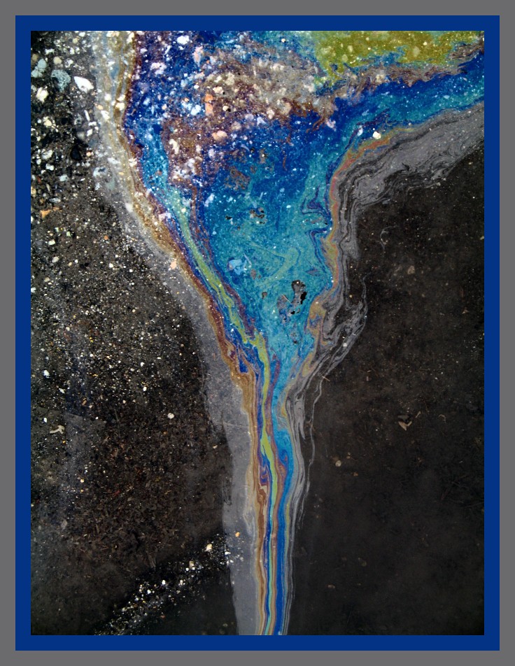 Oil Slick 1 Oil slicks are very beautiful, calling into qu… Flickr