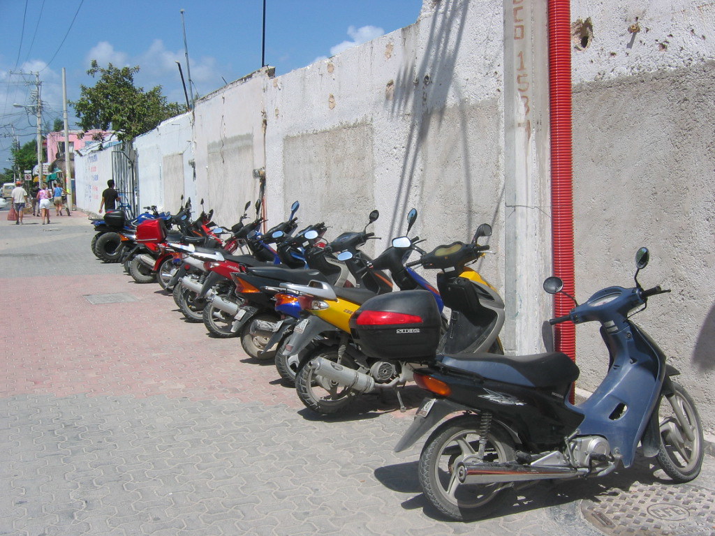 Scooters in Playa del Carmen Mexico Scoots all lined up an… Flickr