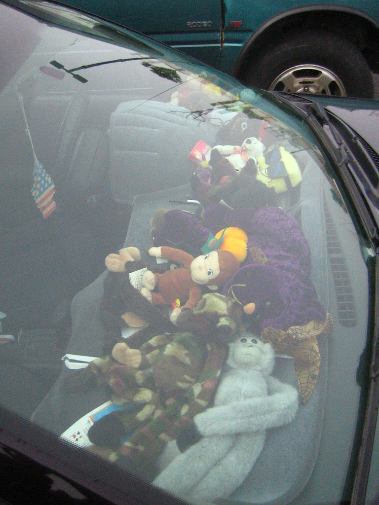 stuffed animals on the dashboard rick Flickr