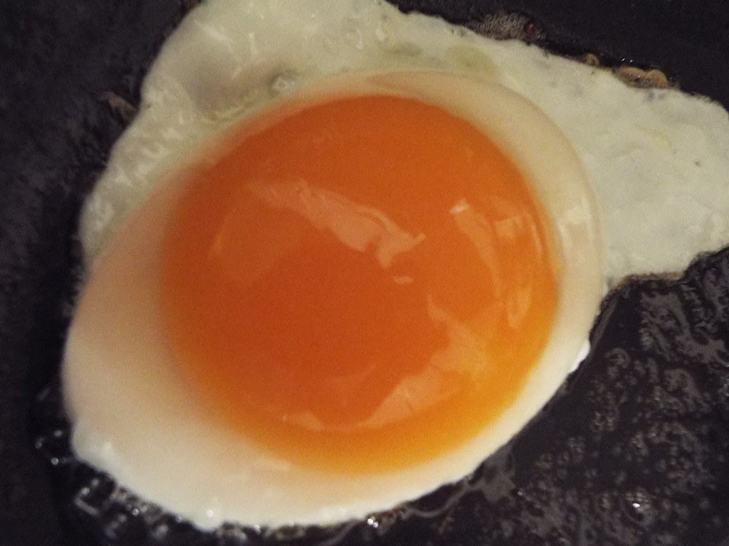 Big Red Yolk This massive red egg yolk (nearly 1" high) an… Flickr