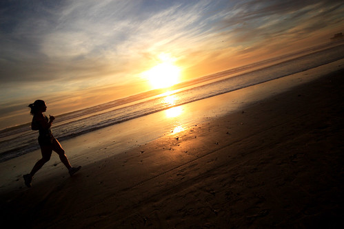 Running Girl | A girl running down the beach in Oceanside | Aaron | Flickr