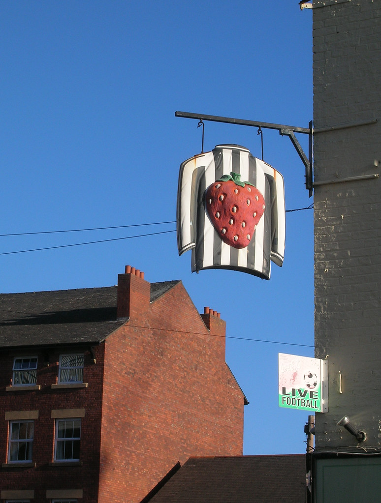 Strawberry The sign hanging from the strawberry pub. The l… Flickr