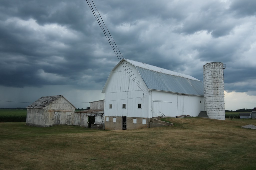 USA farmhouse near Clyde Ohio with gathering storm clouds … Flickr