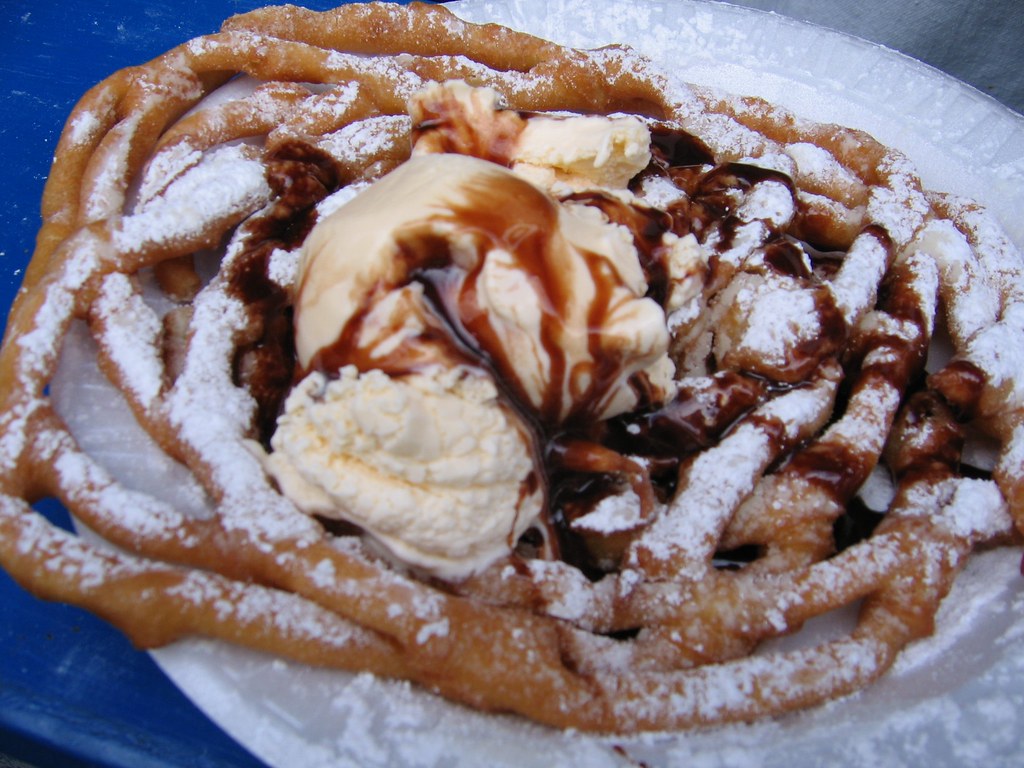 Funnel cake Funnel cake, topped with ice cream and hot fud… julie