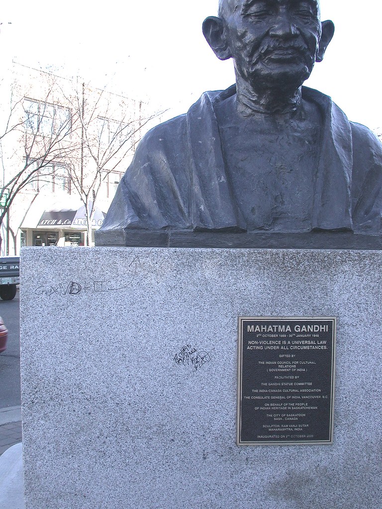 Graf and vandalism on Gandhi statue Sheila Steele Flickr