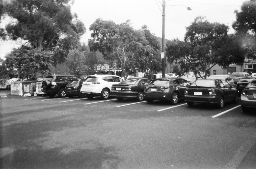 Parking lot Photographed using the Kodak KB10, and Ilford … Flickr
