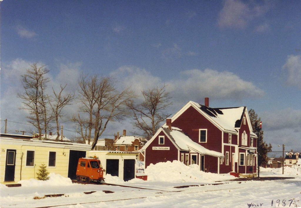 Petitcodiac station and MOW sheds 1987. Photo by Douglas R… Flickr