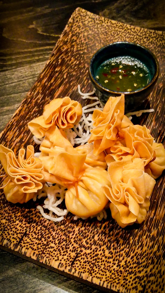 Golden Bags Water chestnuts, carrots, corn, taro, herbs an… Flickr