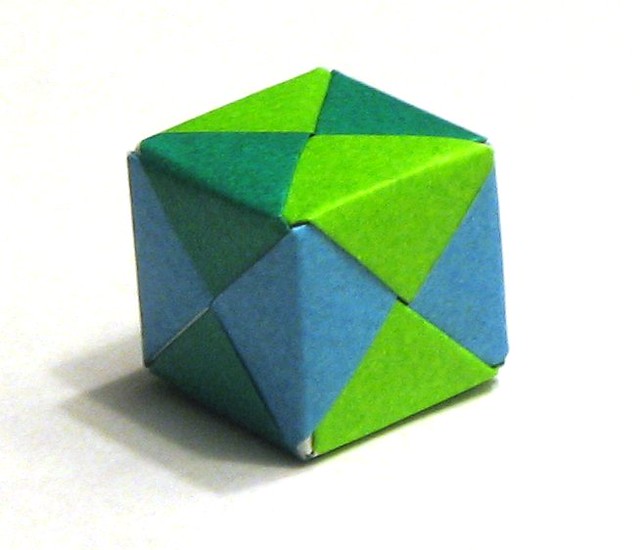 Origami cube Cube made from 6 pieces of origami paper. endolith