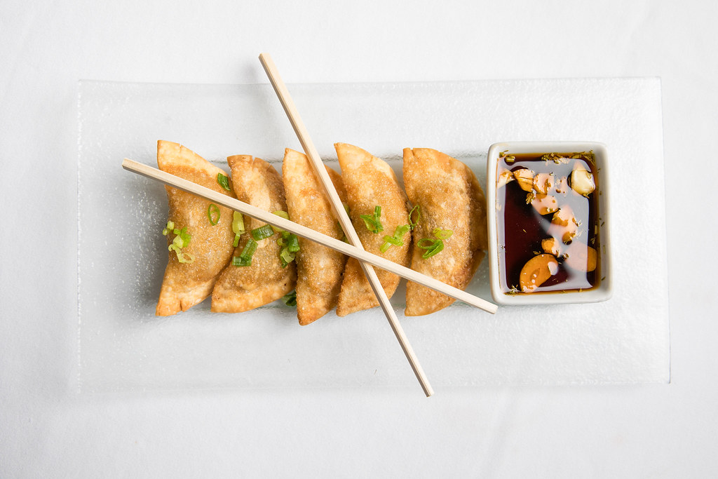 Deep fried pork gyoza dumplings 5 pc, served with garlicc… Flickr