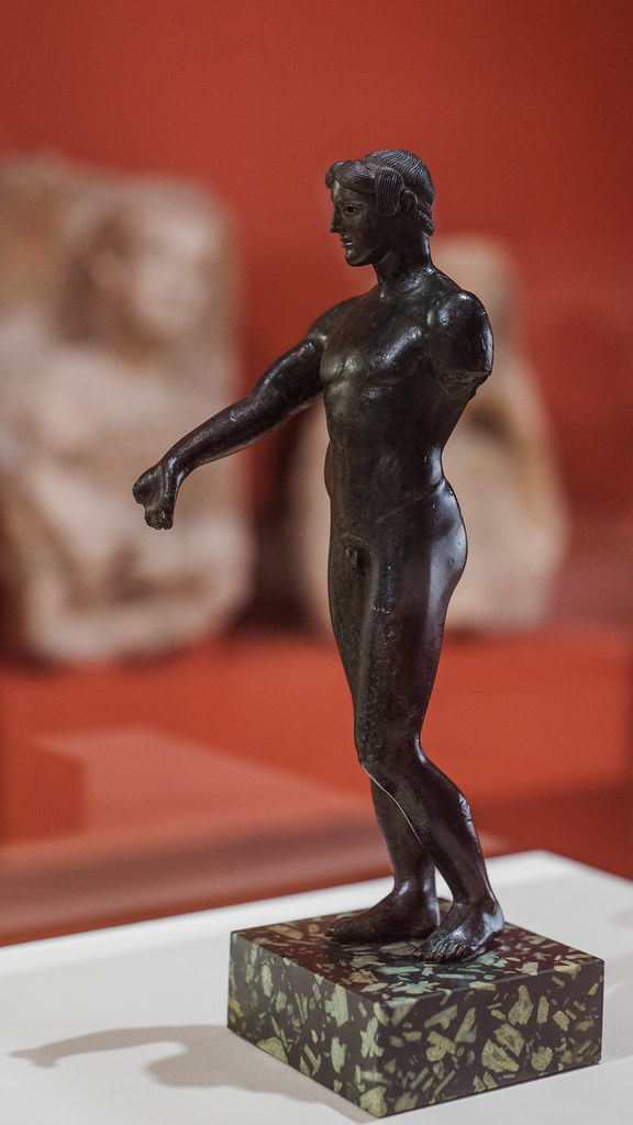 Greek cast bronze statuette of a young male, perhaps Apollo a photo