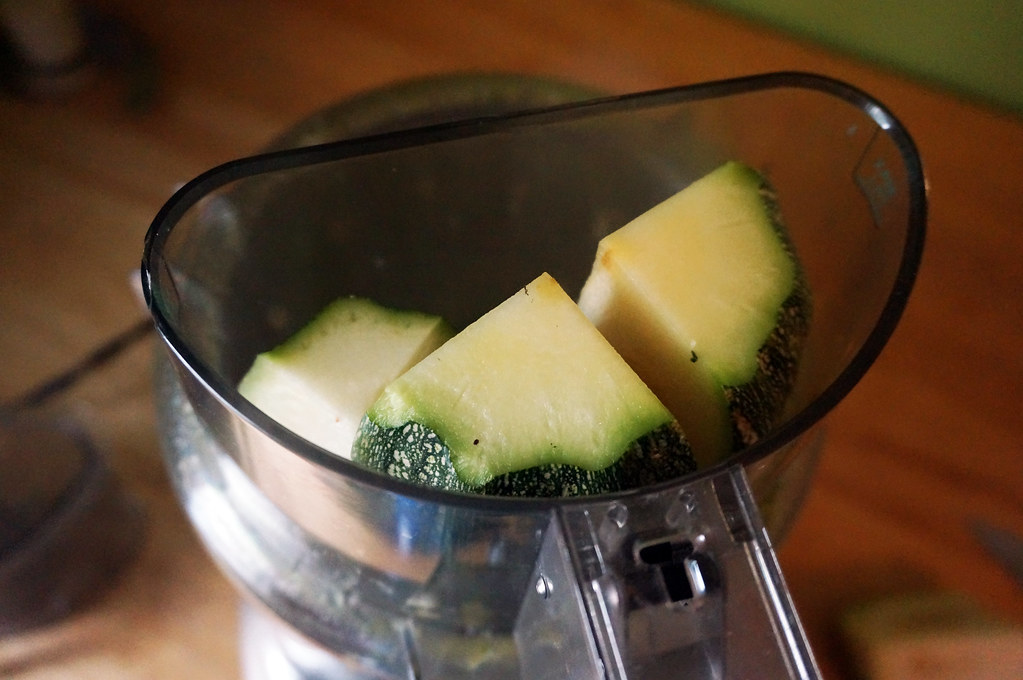 Ready for whizzing Chunks of zucchini sit in the feeder ch… Flickr