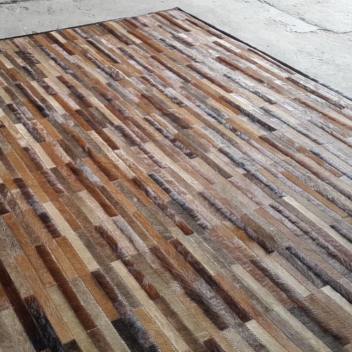 Natural brown Stripes cowhide patchwork rug dubaifastleat… Flickr