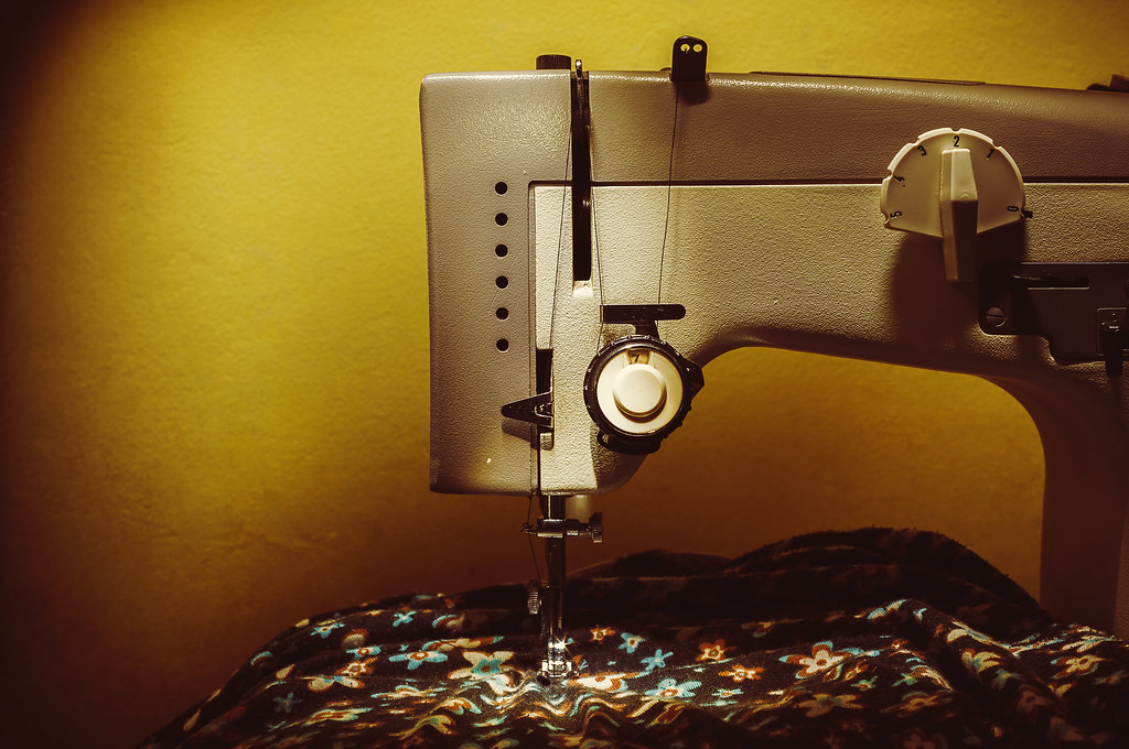 Sewing Machine on Table Closeup view of an old electric se… Flickr