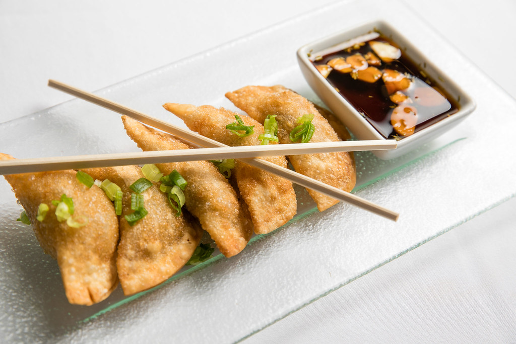 Deep fried pork gyoza dumplings 5 pc, served with garlicc… Flickr
