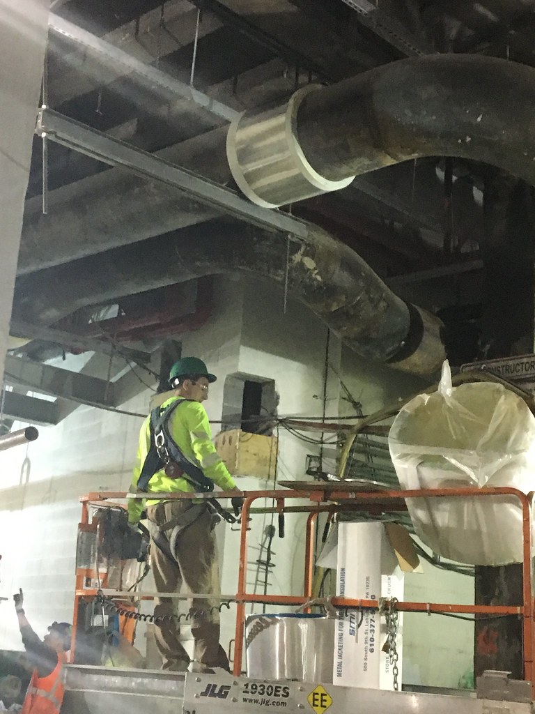 Installing insulation around HVAC duct work in the future … Flickr
