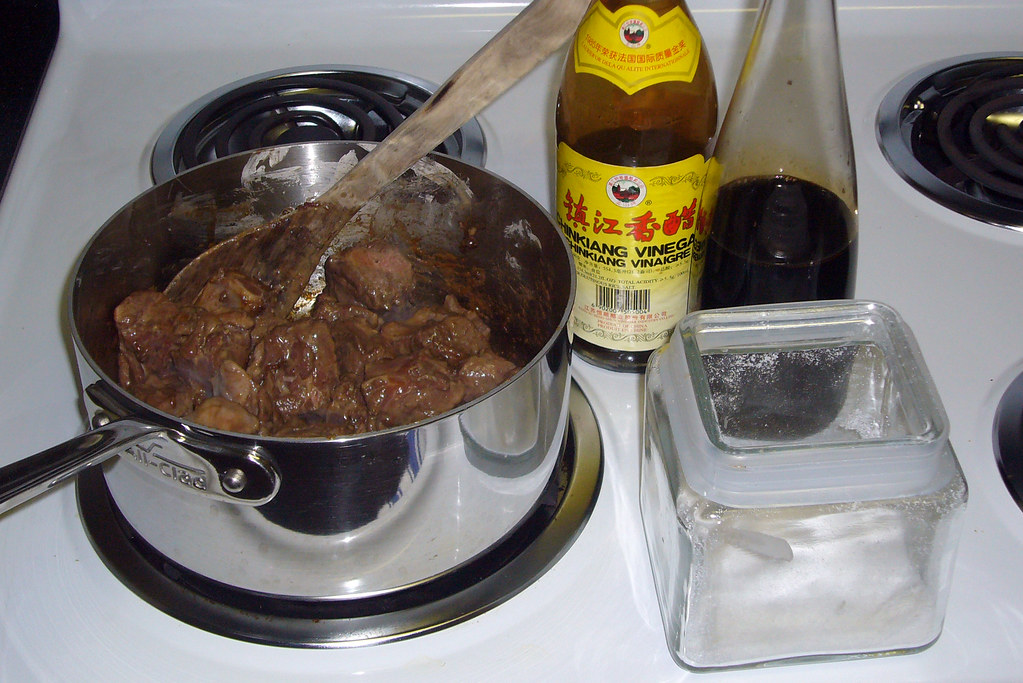 Add soy sauce, rice vinegar, sugar Kent Wang Flickr