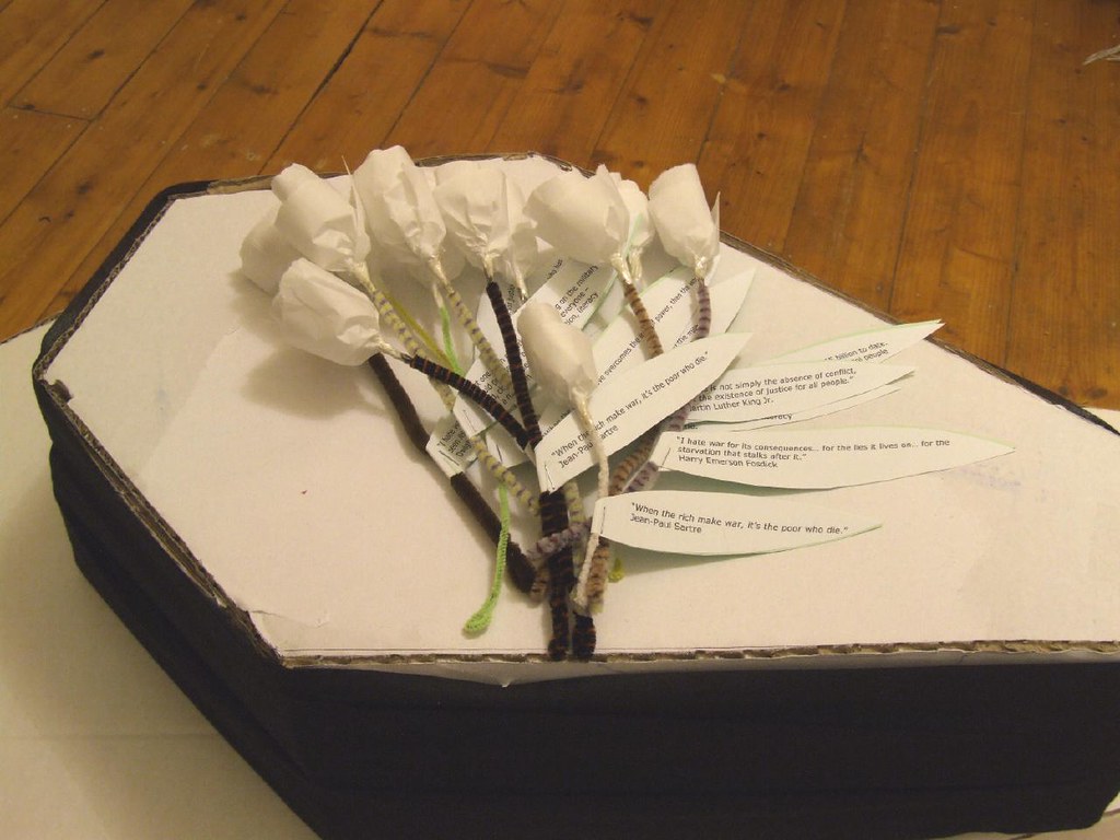 flowers and coffin Vertigogen Flickr