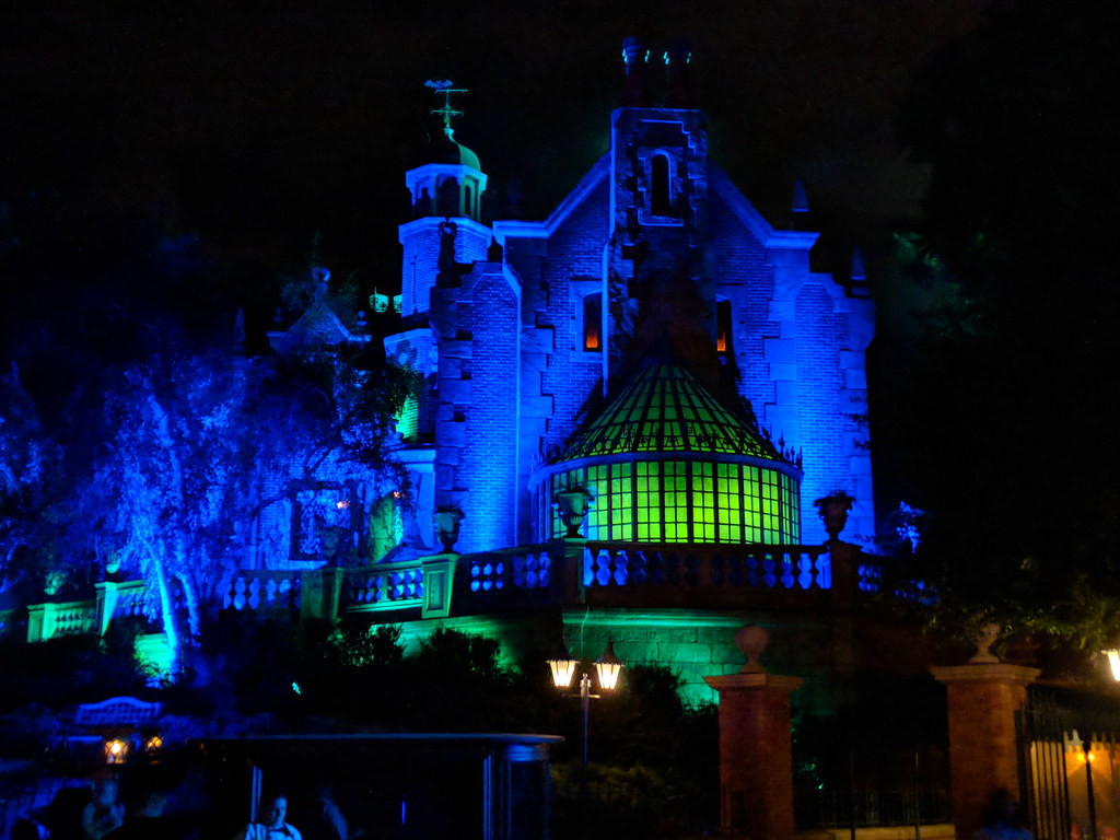 Haunted Mansion Magic Kingdom The Haunted Mansion lit up… Flickr