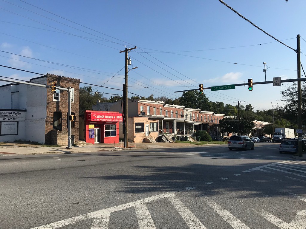 Rowhouses and commercial building, Wilkens Avenue and Deso… Flickr