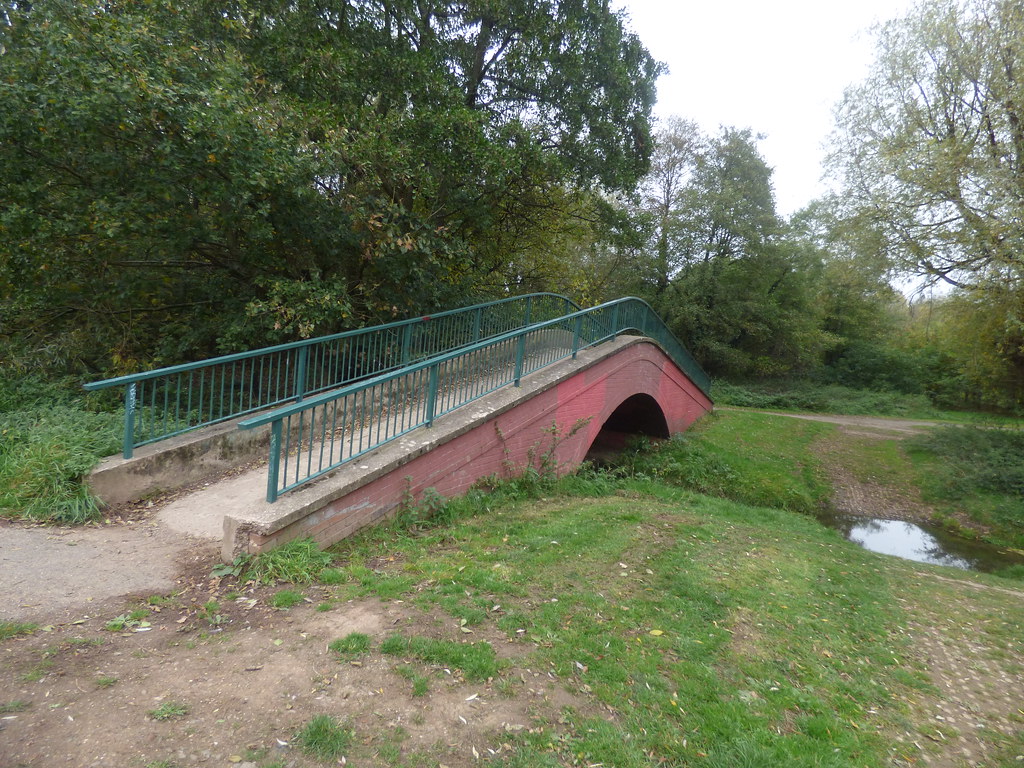 Woodgate Valley Country Park footbridge on the Bourn Brook a photo