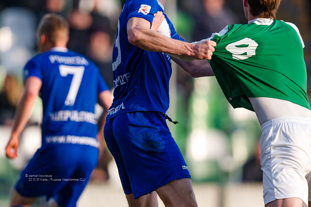 stretch jersey pulling football Damian Kosciesza Flickr