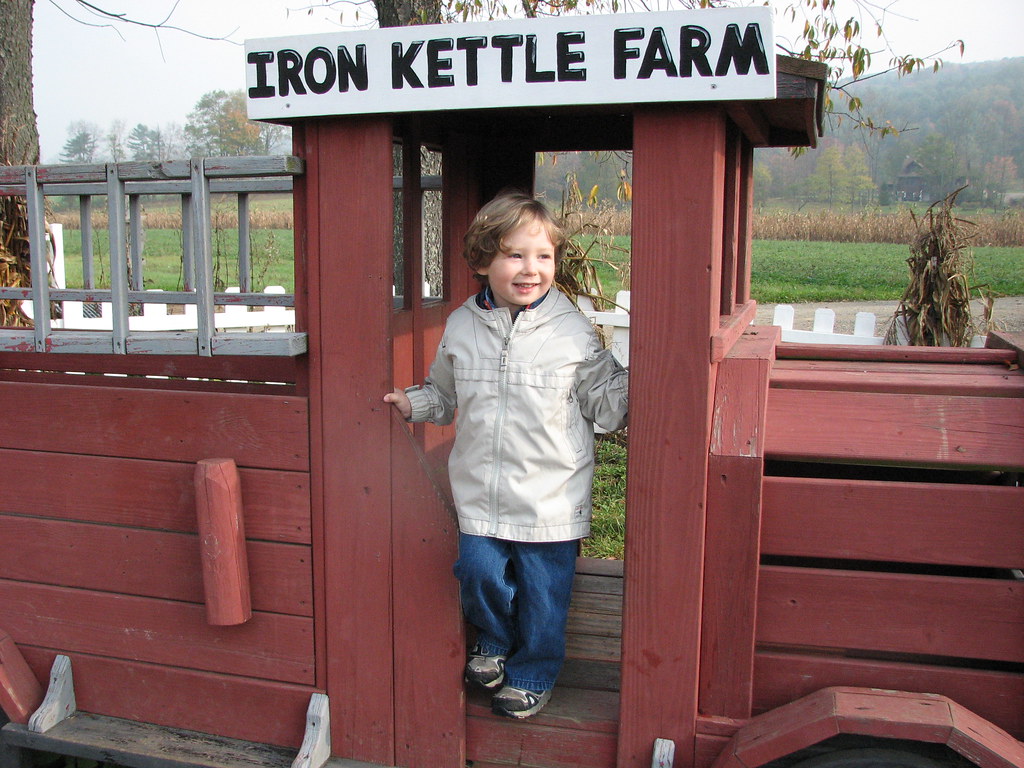 Eli in fire truck at Iron Kettle Farm Dana.Wardlaw Flickr