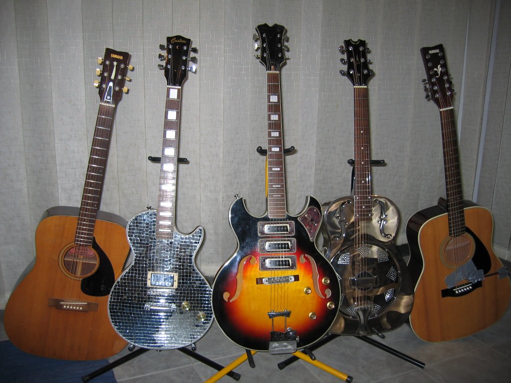 Acoustic and Electric Guitars Left to right 1970s Yamaha … Flickr