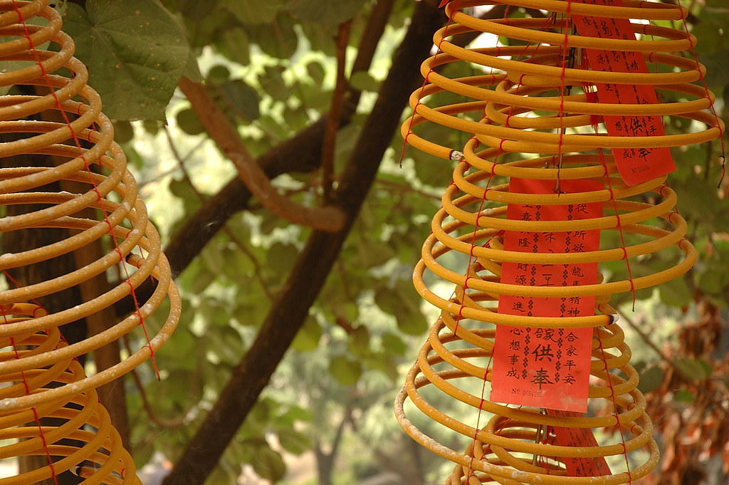 Incense burning Spiral cone shaped incense burning at the … Flickr