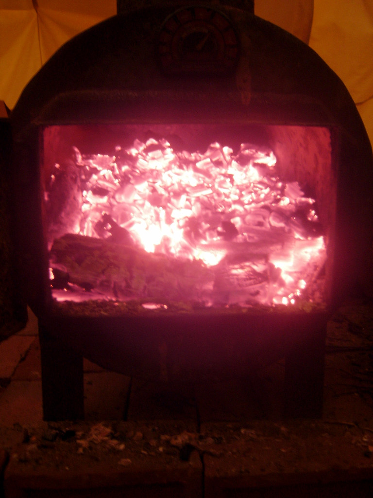 bed of coals.jpg Here's the woodstove packed full of nice … Flickr