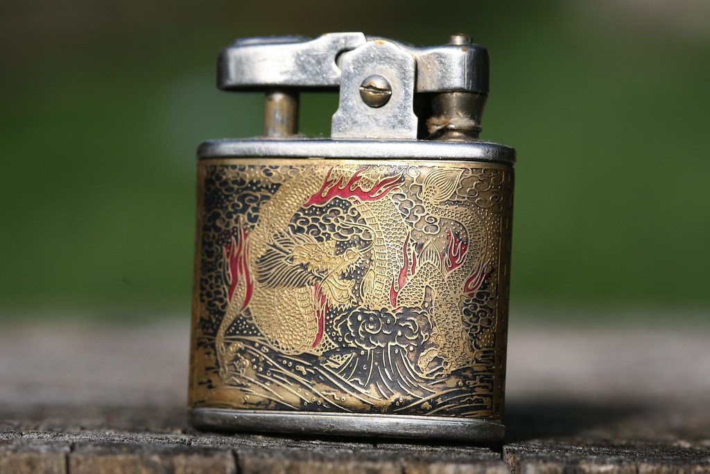 Japanese Dragon Lighter Side A Bought at an antique shop f… Flickr