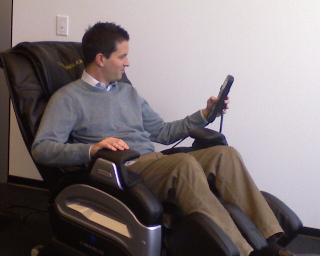 Google DC's massage chair Googler Adam tries out the new m… Flickr