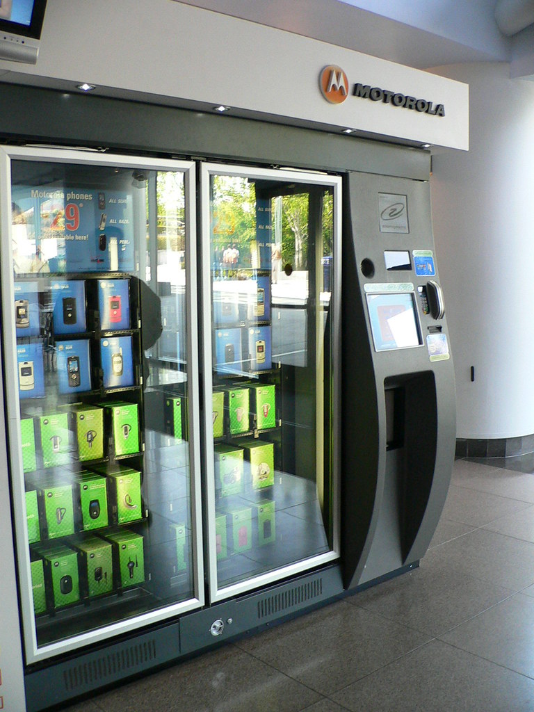 Cell phone dispenser I certainly had never seen this befor… Flickr