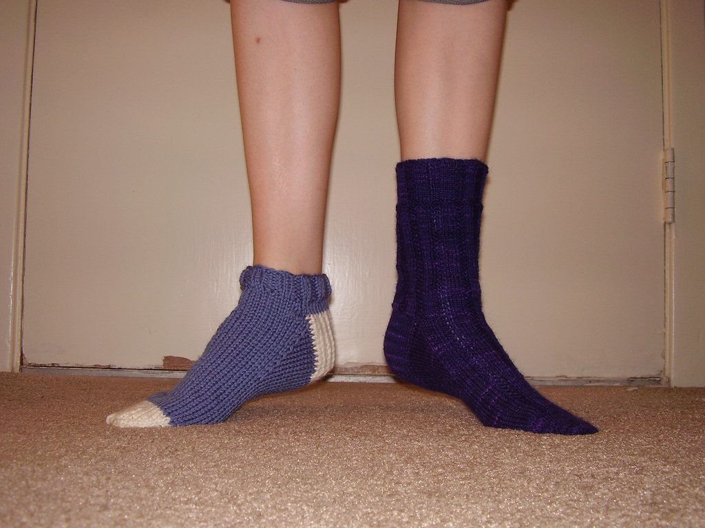 This pair does not match The taller sock on the right is t… Flickr