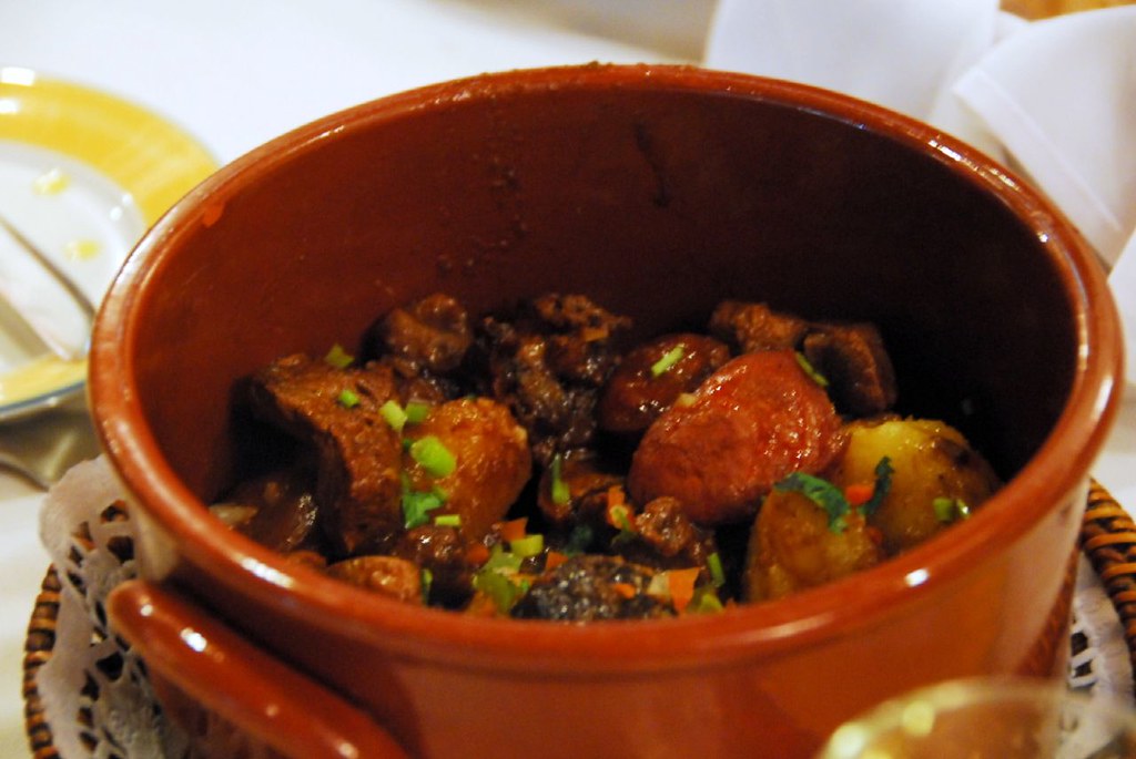 sauteed pork tenderloin with chourico & morcela (portugues… Flickr