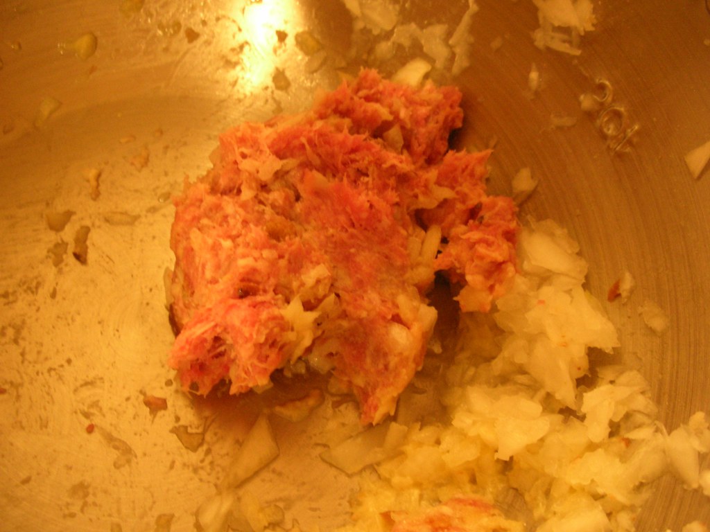 Raw meat Ground beef, ground pork, bread crumbs and onions… Flickr