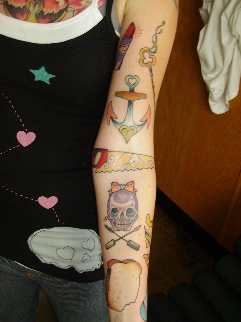 Most random tattoos ever! Dani's sleeve of a saw, anchor, … Flickr