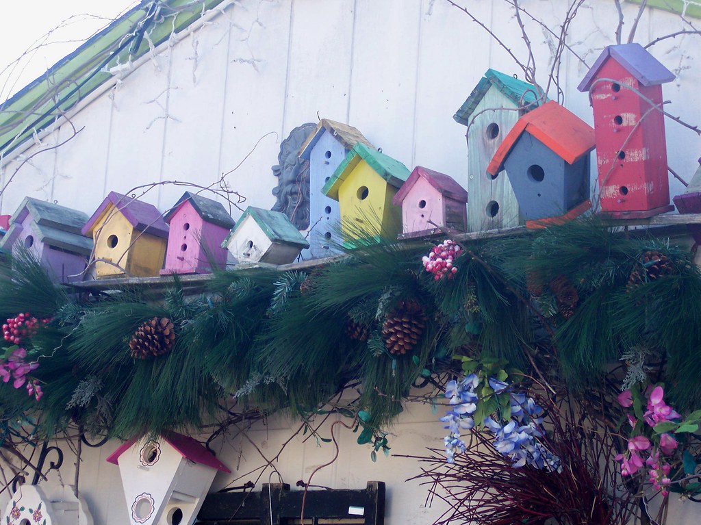 Birdhouse Garland Above a flower shop in Maine Karen Cox Flickr
