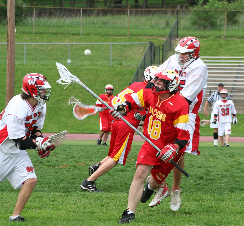 Lacrosse A Lakota West lacrosse player tackles a Fenwick d… Flickr