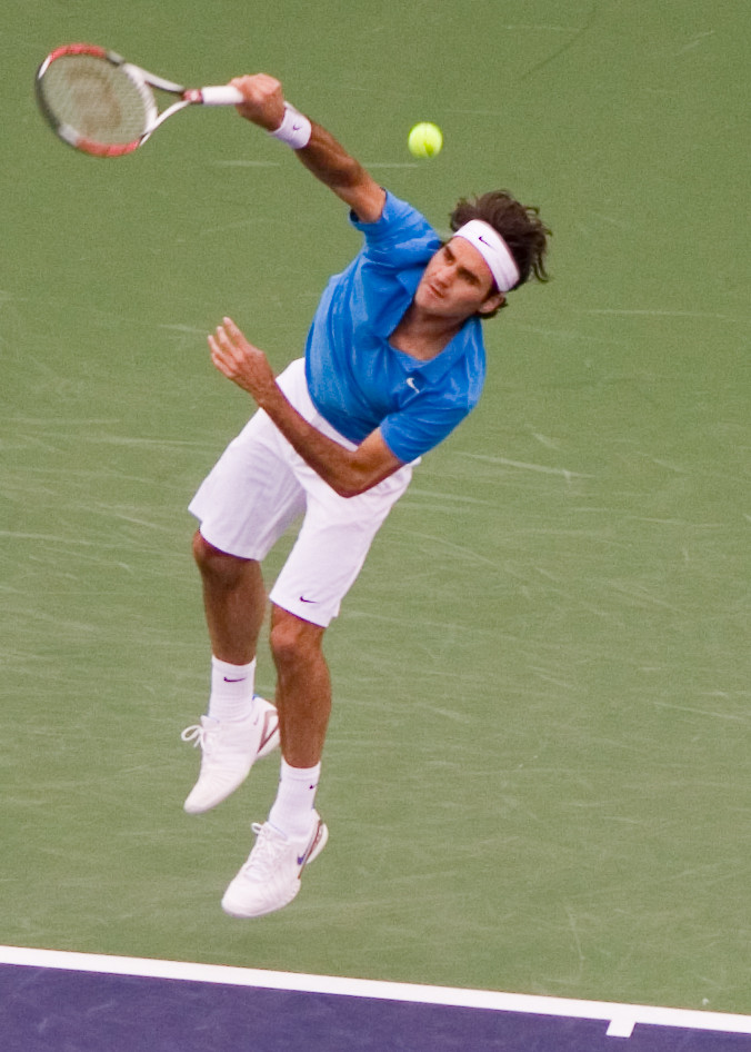 Federer serve Roger throws his body into his serve at the … Flickr
