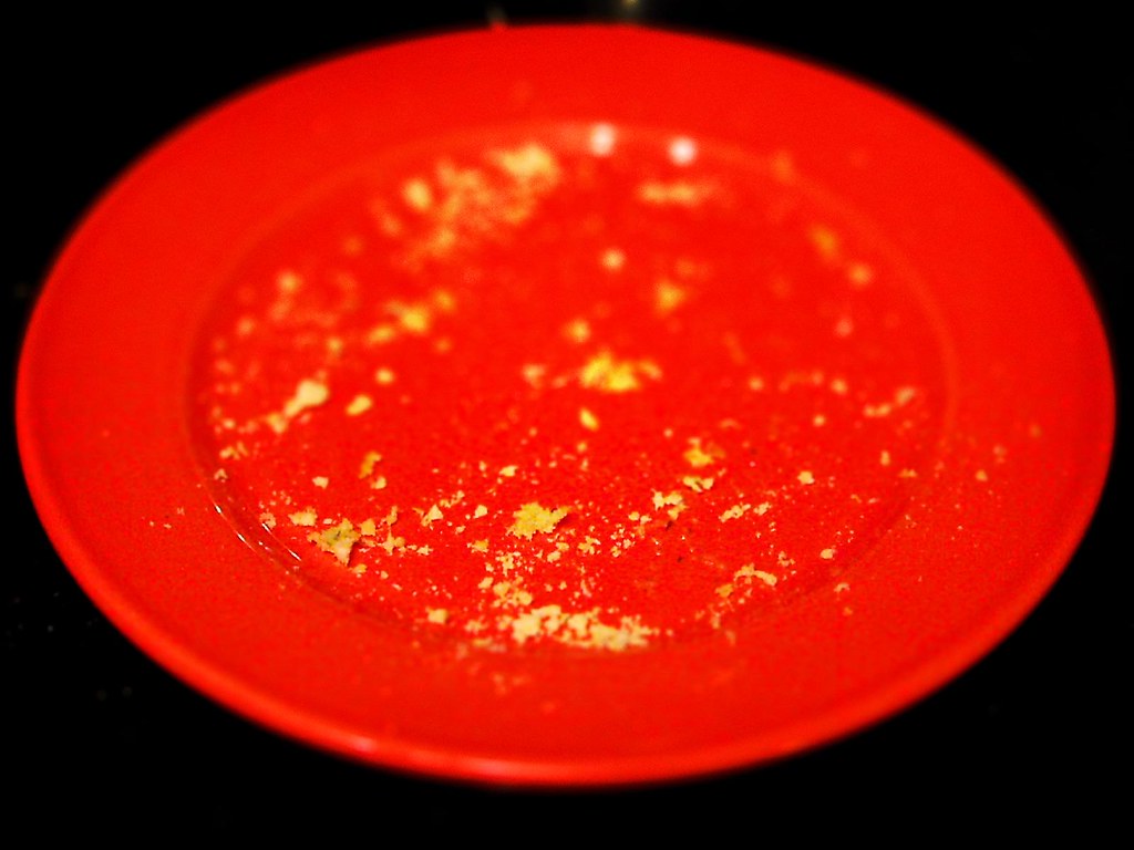 orange side plate with garlic bread crumbs, faux tiltshift… Flickr