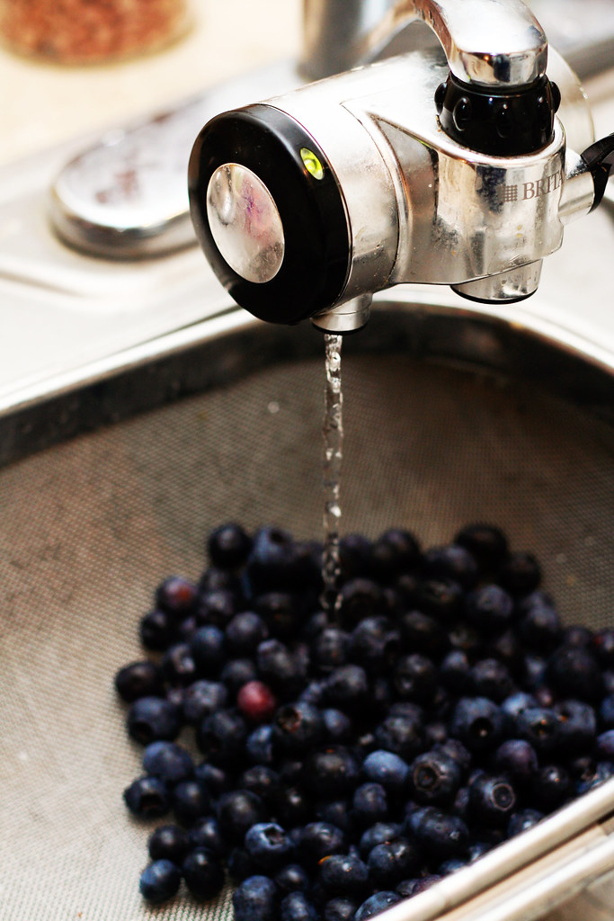 Washing the Blueberries (Part of a series of photos on mak… Flickr