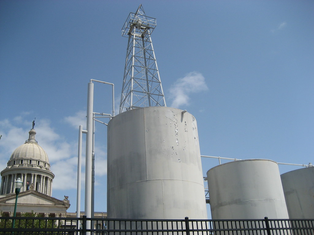 Oil derrick in front of capitol building A derrick and tan… Flickr