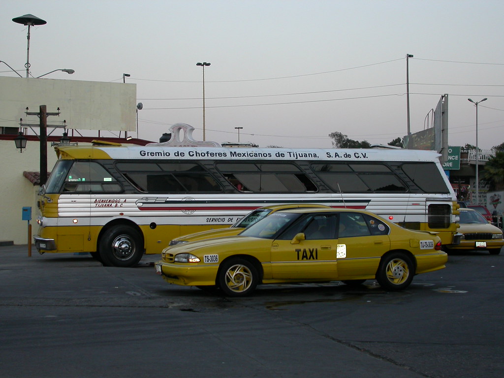 Tijuana Taxi and Bus A Pontiac Bonneville taxi and an old … Flickr
