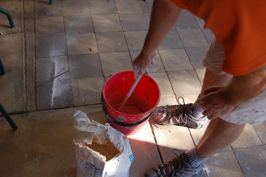 Alan mixing the gyprock filler.... Love the Socks.........… Flickr